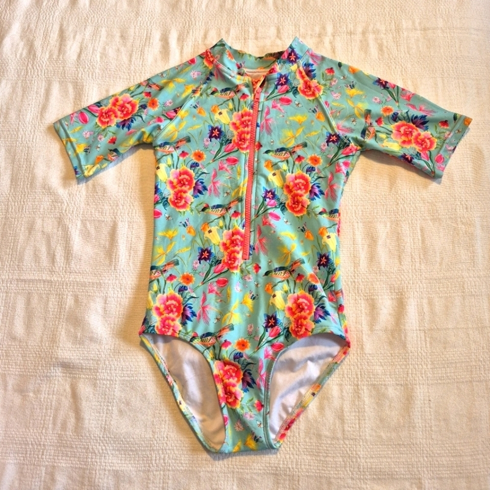 Tame the Sun girls size 9 ruffle tush 1 piece short sleeve UPF 50+ swim suit EUC